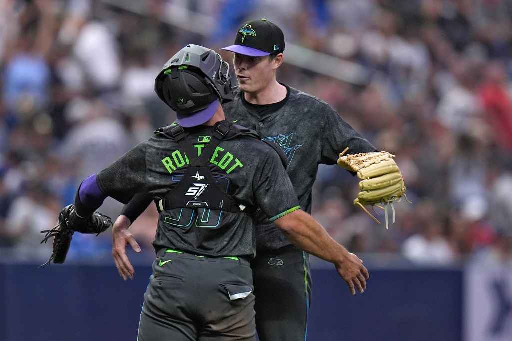 Former Yankees catcher Ben Rortvedt chest bumps Pete Fairbanks after the Rays' 7-2 win over the Bombers.