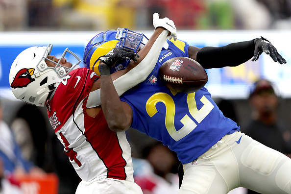 Rams defensive back David Long Jr. breaks up a pass intended for the Cardinals' Rondale Moore during a 2022 game.