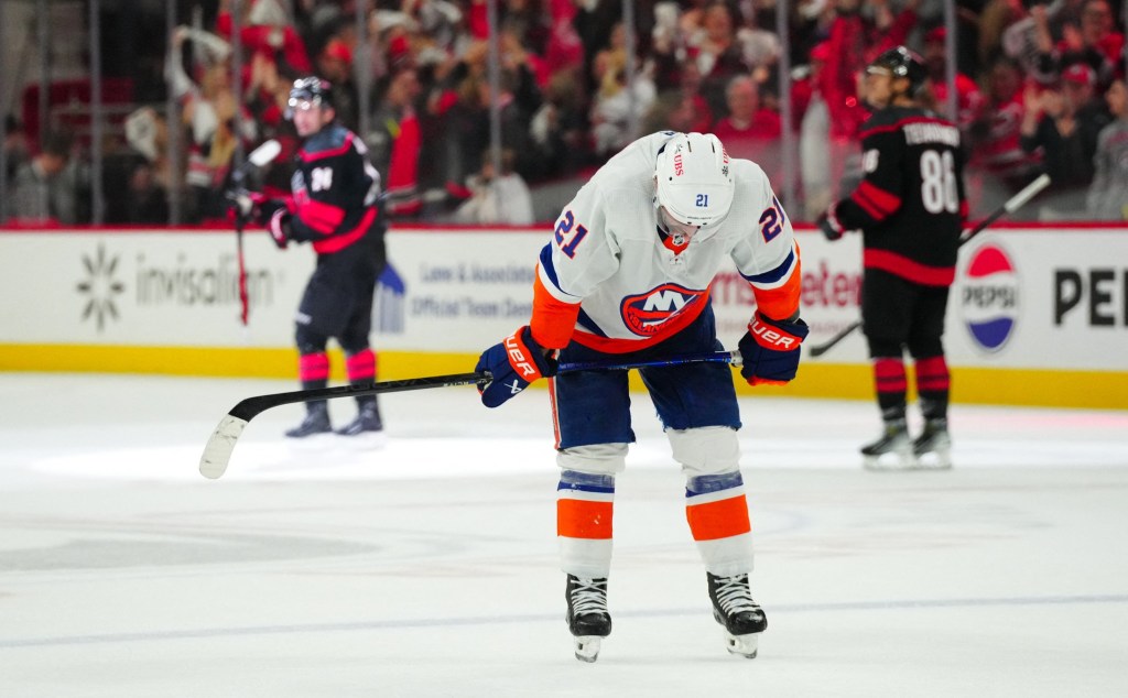 A dejected Kyle Palmieri looks down at the ice after Seth Jarvis scores an empty-net goal in the closing minutes of the Islanders' 6-3 season-ending Game 5 loss to the Hurricanes.