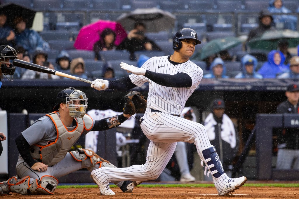 Juan Soto hits a three run RBI double scoring Jon Berti, Anthony Volpe and Jose Trevino in the seventh inning of a Yankees win over the Tigers on Sunday.