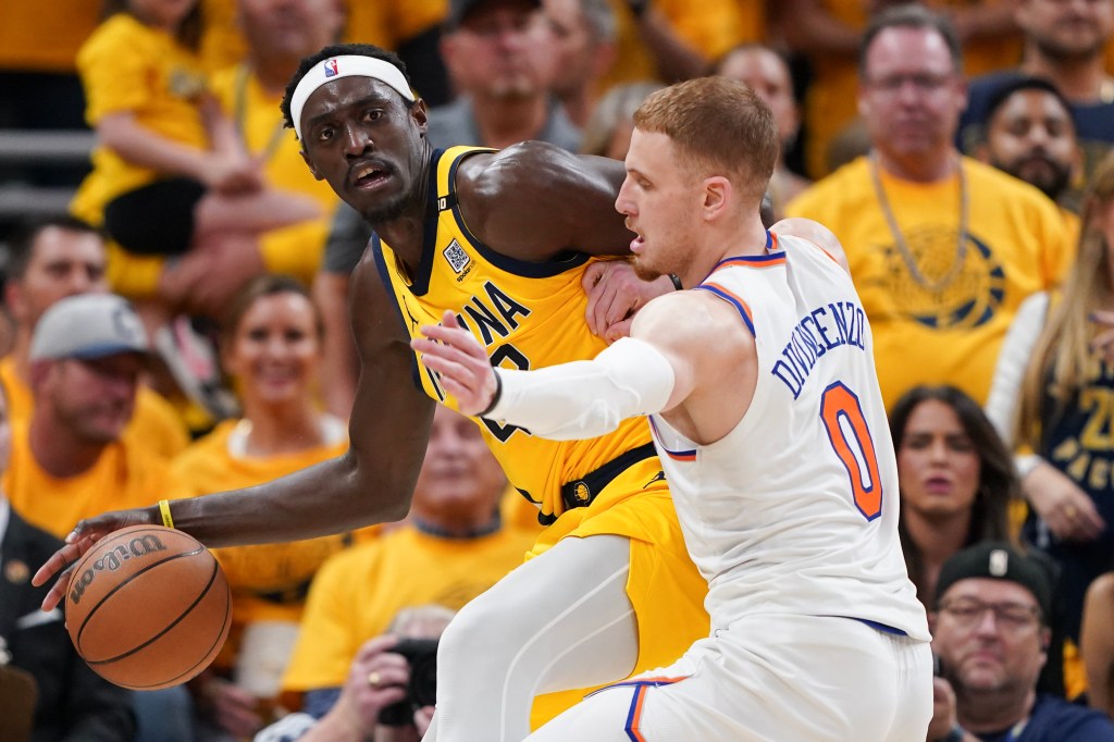 Pascal Siakam, who scored 25 points, makes a move on Donte DiVincenzo during the Knicks' 116-103 loss to the Pacers in Game 6.