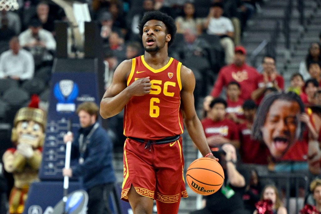 Bronny James #6 of the USC Trojans handles the ball in the first half of a first round game against the Washington Huskies during the Pac-12 Conference basketball tournament at T-Mobile Arena on March 13, 2024 in Las Vegas, Nevada. The Trojans defeated the Huskies 80-74. 