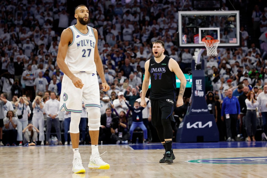 Luka Doncic #77 of the Dallas Mavericks celebrates a three point basket during the fourth quarter