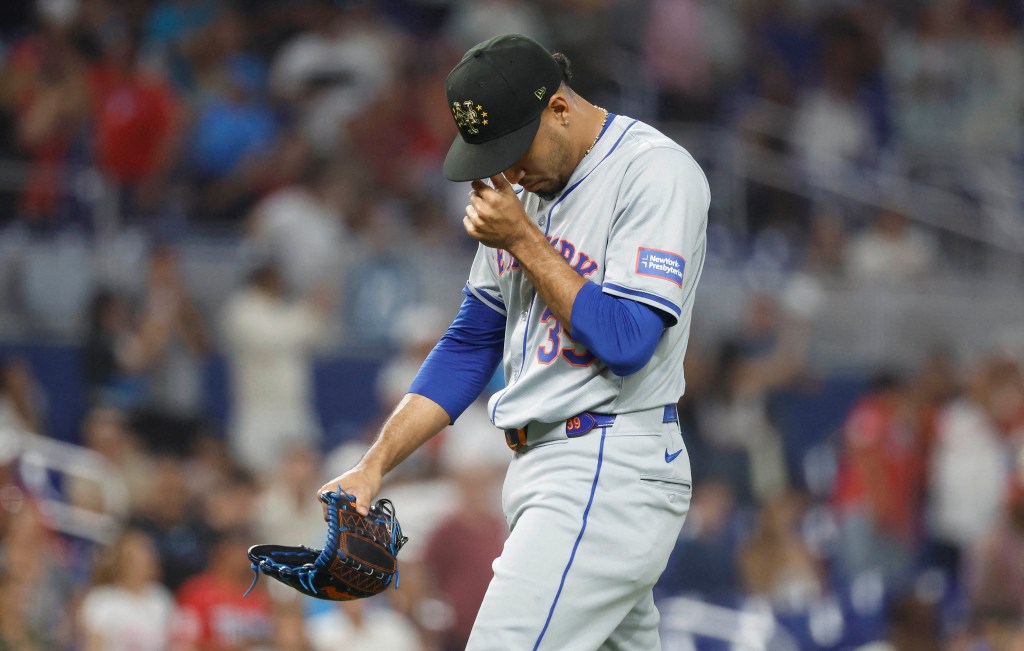 Edwin Diaz wallks off the mound after getting pulled in the ninth inning of the Mets' 10-9, 10-inning loss to the Marlins.