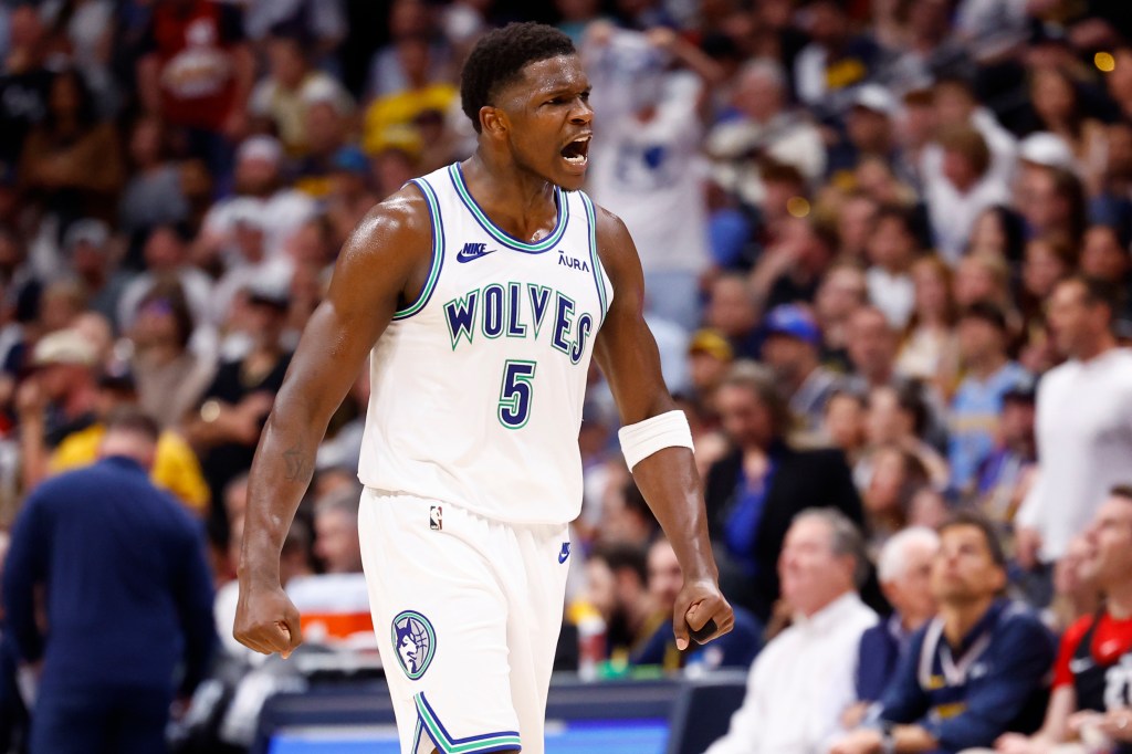 Anthony Edwards #5 of the Minnesota Timberwolves celebrates a three point basket during the third quarter against the Denver Nuggets in Game 7 of the Western Conference Second Round Playoffs.