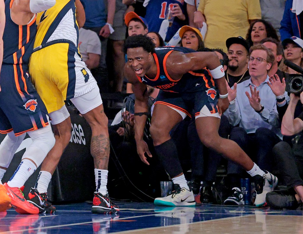 OG Anunoby grabs his leg after he injuries his hamstring driving to the basket during the third quarter.