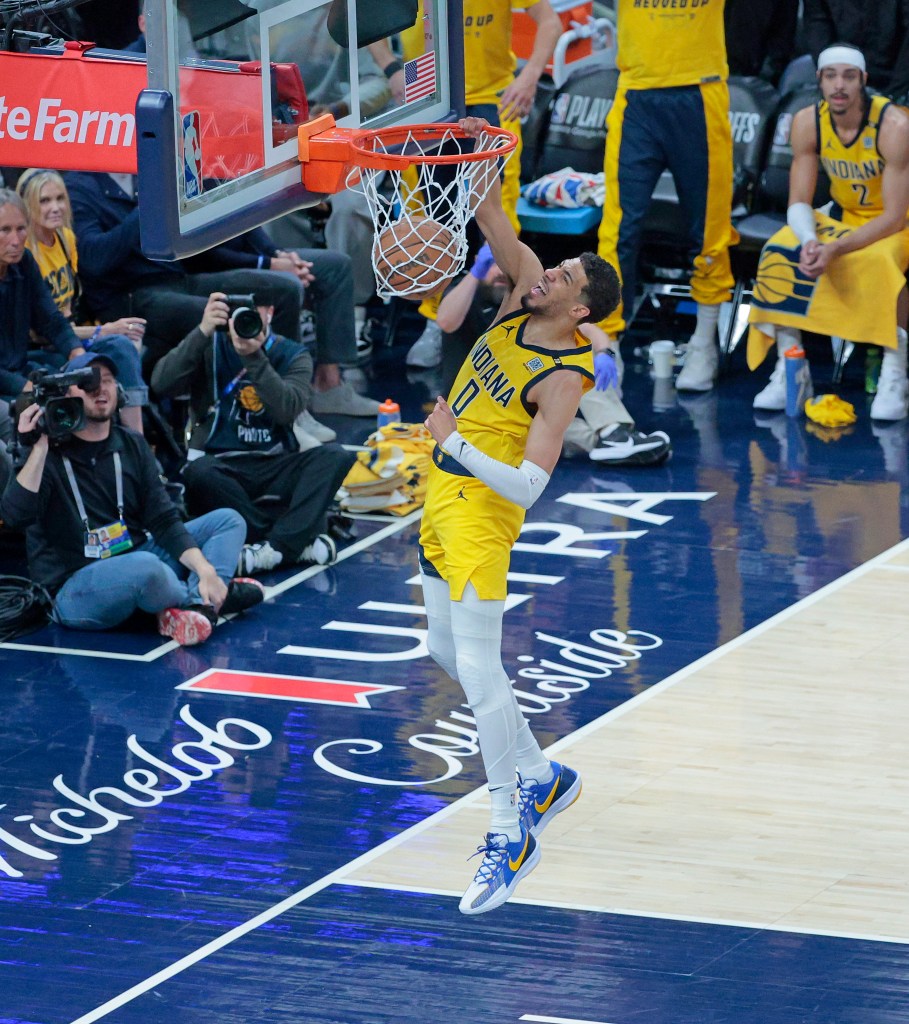 Tyrese Haliburton #0 of the Indiana Pacers slams the ball during the first quarter.