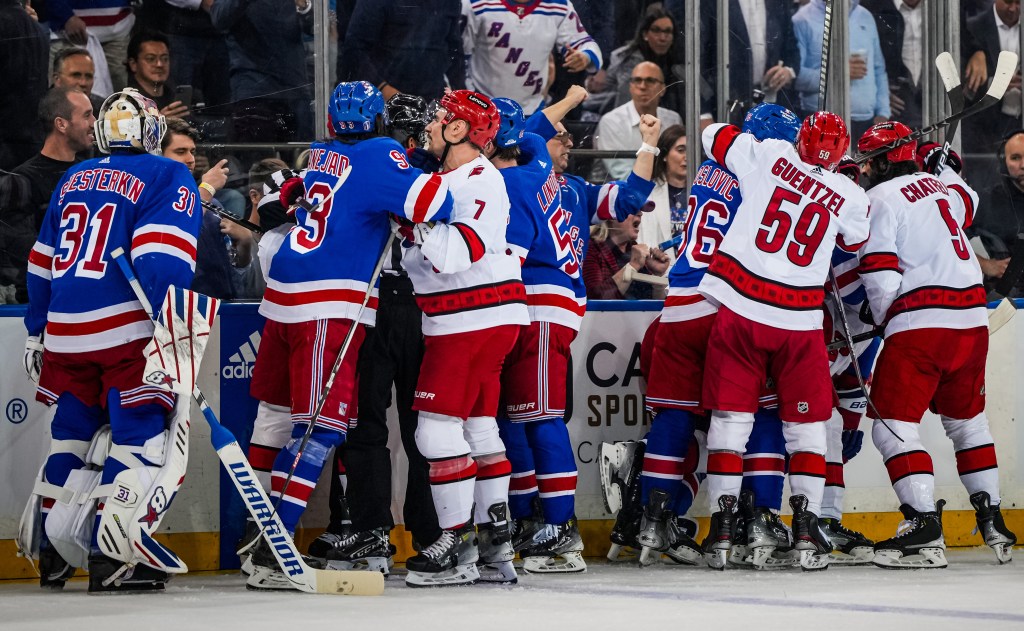 Rangers and Hurricanes players get into a scuffle after Igor Shesterkin was taken out by Andrei Svechnikov in the firs period of the Rangers' Game 2 4-3 win over the Hurricanes in double overtime.