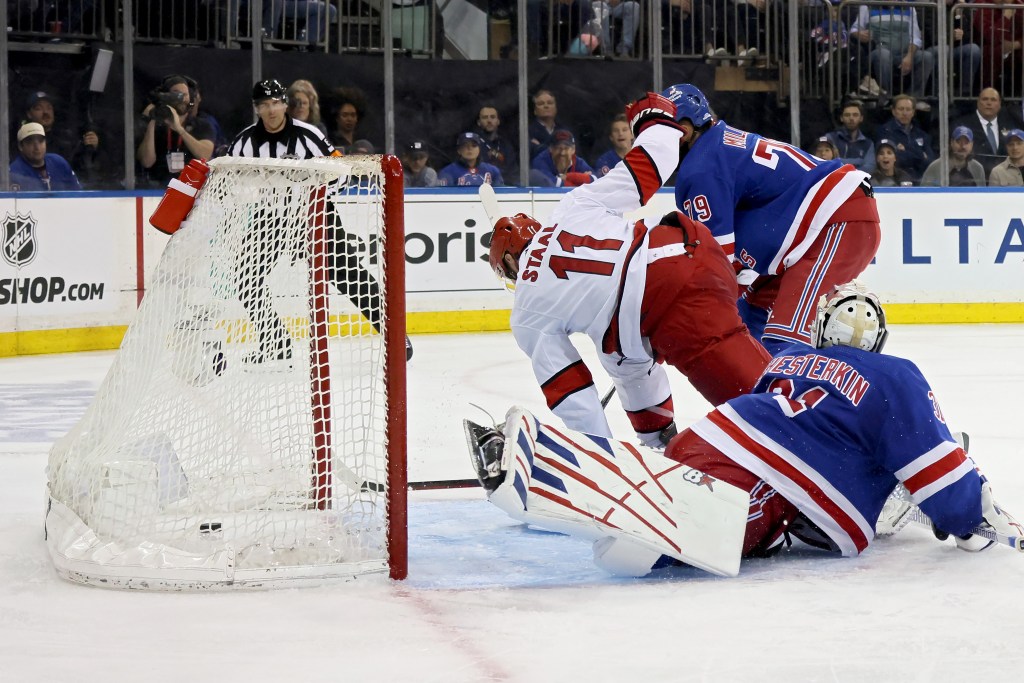 Jordan Staal #11 of the Carolina Hurricanes scores a goal against Igor Shesterkin #31 of the New York Rangers during the third period