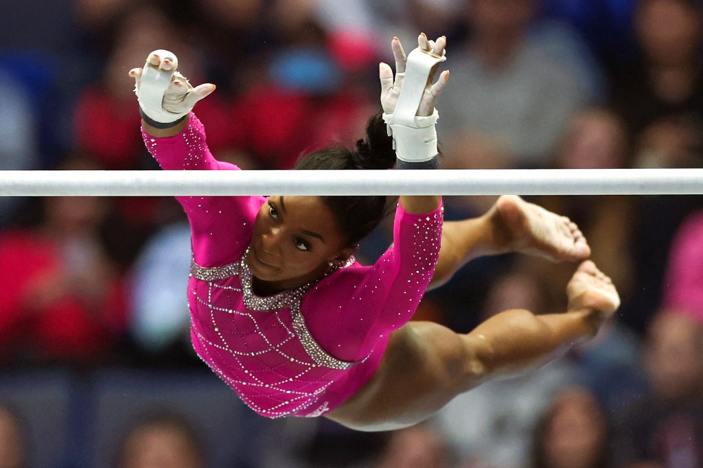 Simone Biles competes on the uneven bars during the U.S. Classic.