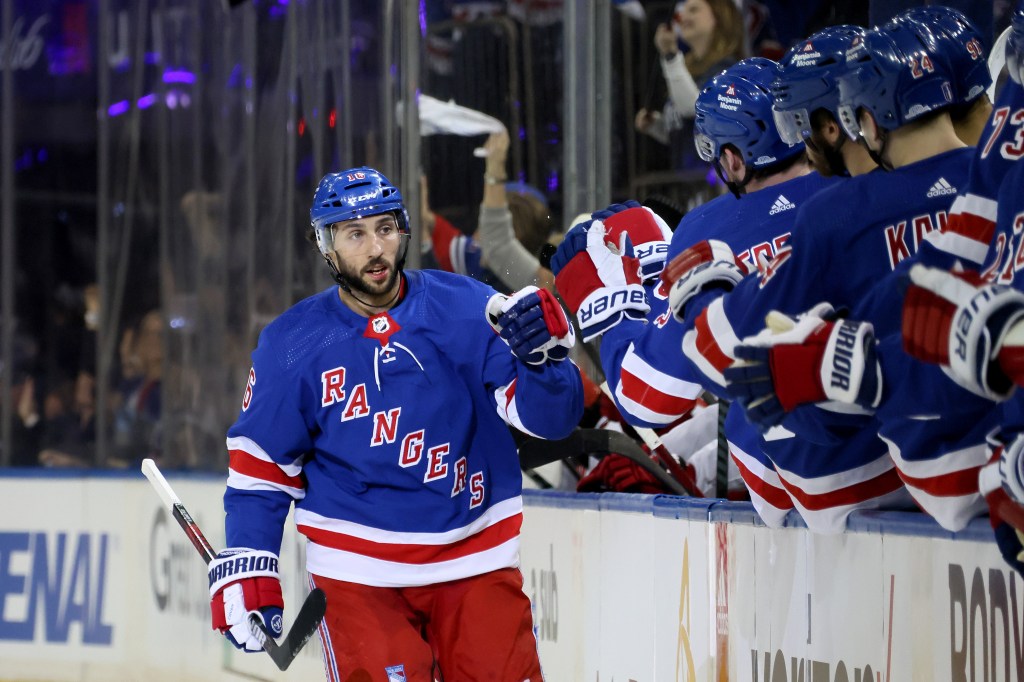 Vincent Trocheck #16 of the New York Rangers celebrates with his teammates after scoring a goal against the Carolina Hurricanes during the first period in Game One of the Second Round of the 2024 Stanley Cup Playoffs at Madison Square Garden on May 05, 2024 in New York City. 