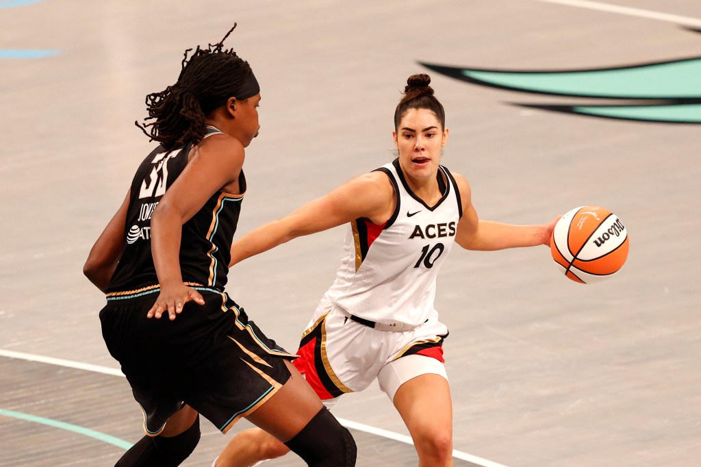 Kelsey Plum #10 of the Las Vegas Aces looks to pass against Jonquel Jones #35 of the New York Liberty in the first quarter during Game Four of the 2023 WNBA Finals at Barclays Center on October 18, 2023 in New York City.