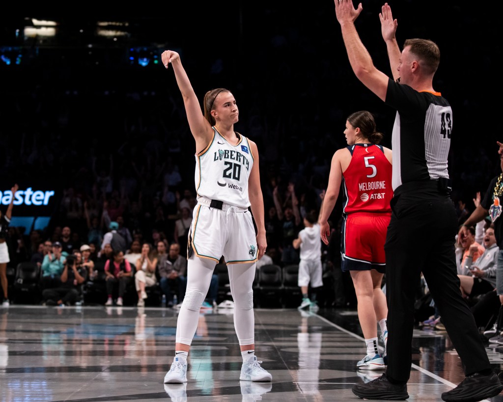 Sabrina Ionescu #20 of the New York Liberty reacts after 3 pointer against the Washington Mystics at Barclays Center . 