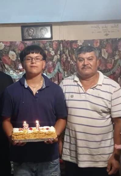 Benedicto Jaramillo, 50, at right, and his 15-year-old son, Angel Alejandro 