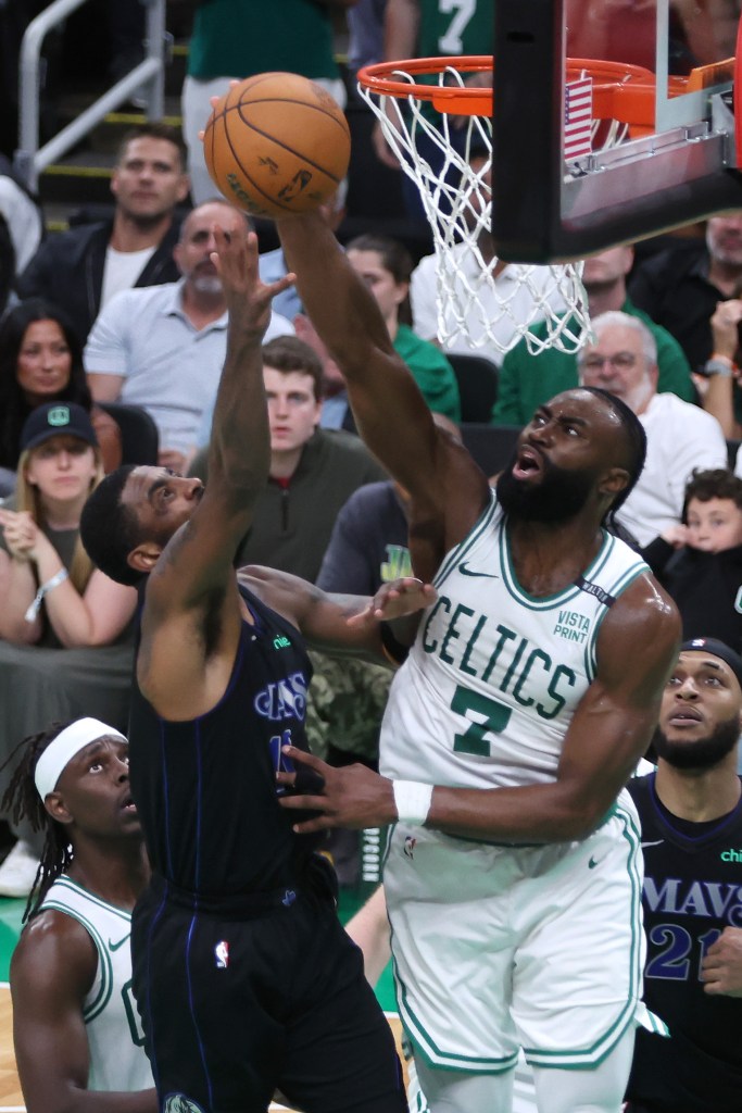 Jaylen Brown #7 of the Boston Celtics blocks a shot from Kyrie Irving #11 of the Dallas Mavericks during the third quarter in Game One of the 2024 NBA Finals at TD Garden on June 06, 2024 in Boston