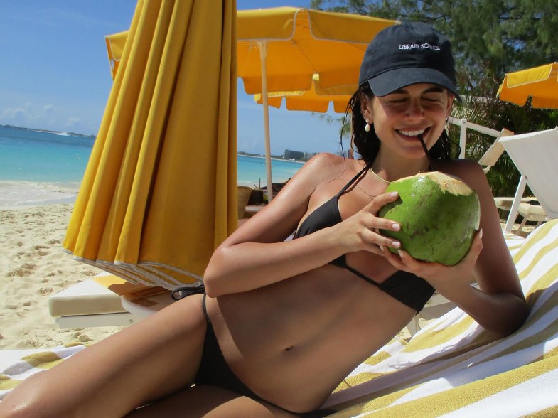 CUCKOO FOR COCONUTS: Model Kaia Gerber kicks back and relaxes in the Cayman Islands.