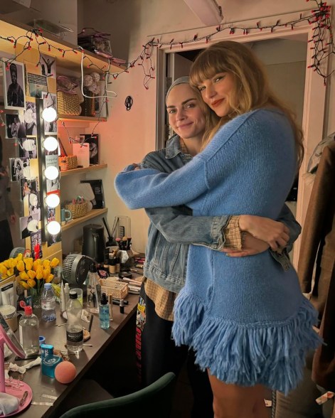 BUDDY SYSTEM: Bestie to the rescue! In London, Taylor Swift (right) visits Cara Delevingne backstage at one of Cara’s last performances of “Cabaret.”