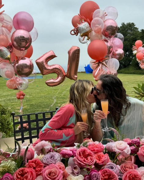 IN FULL KLUM: Heidi Klum celebrates turning 51 with a smooch. 