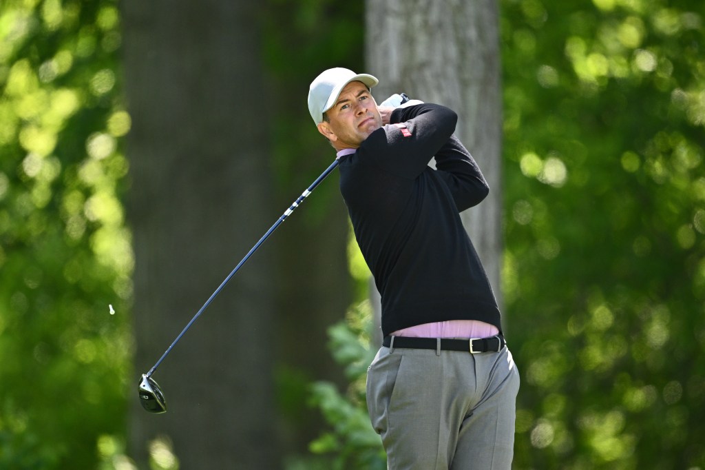 Adam Scott of Australia plays his shot from the seventh tee during the first round of the RBC Canadian Open.