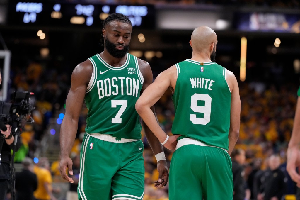 Jaylen Brown (l) and Derrick White (r) have the Celtics four wins from a title.