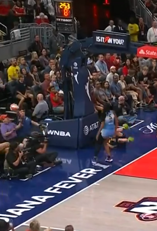 Michael Ledecky saves a tipped ball from uncle John Ledecky's face during the Sky vs. Fever game.