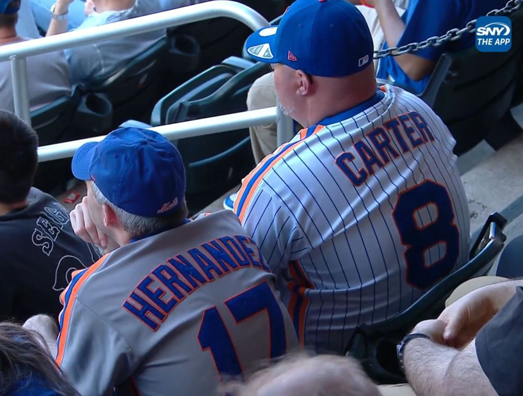 Two fans, one in a Keith Hernandez jersey and one in a Gary Carter jersey, were shown on SNY's Mets broadcast on Saturday.