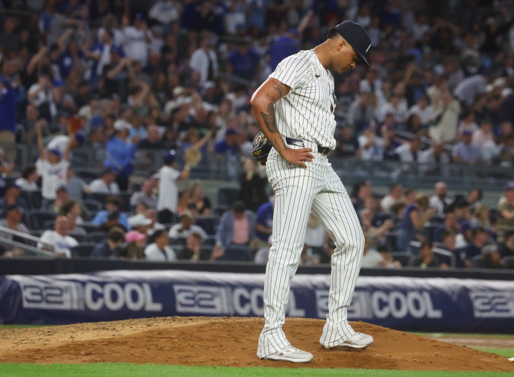 Luis Gil reacts after giving up a home run to Teoscar Hernández #37 of the Los Angeles Dodgers during the sixth inning when the New York Yankees played the Los Angeles Dodgers Sunday, June 9, 2024.