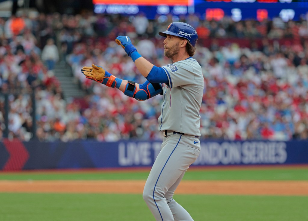 Jeff McNeil #1 of the New York Mets reacts after he hits a single during the 9th inning.