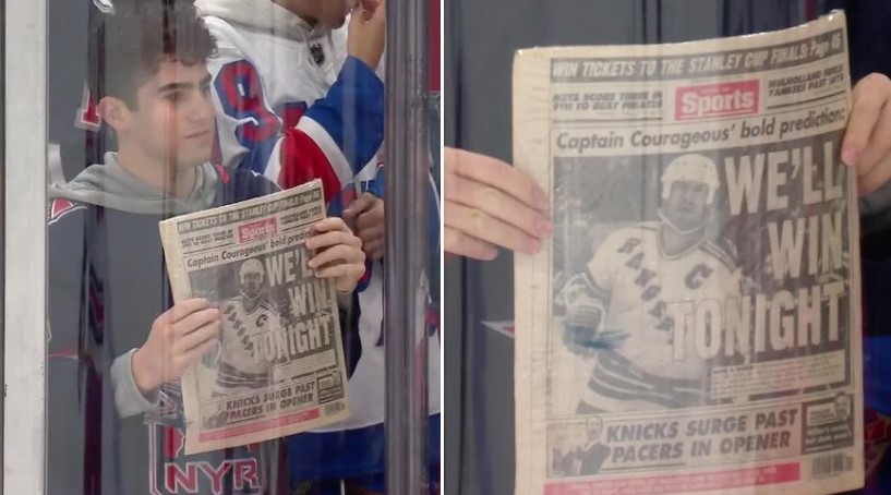 A Rangers fan holds up The Post's legendary back page of Mark Messier's Game 6 guarantee in which he said the Rangers would beat the Devils. And the rest was history.