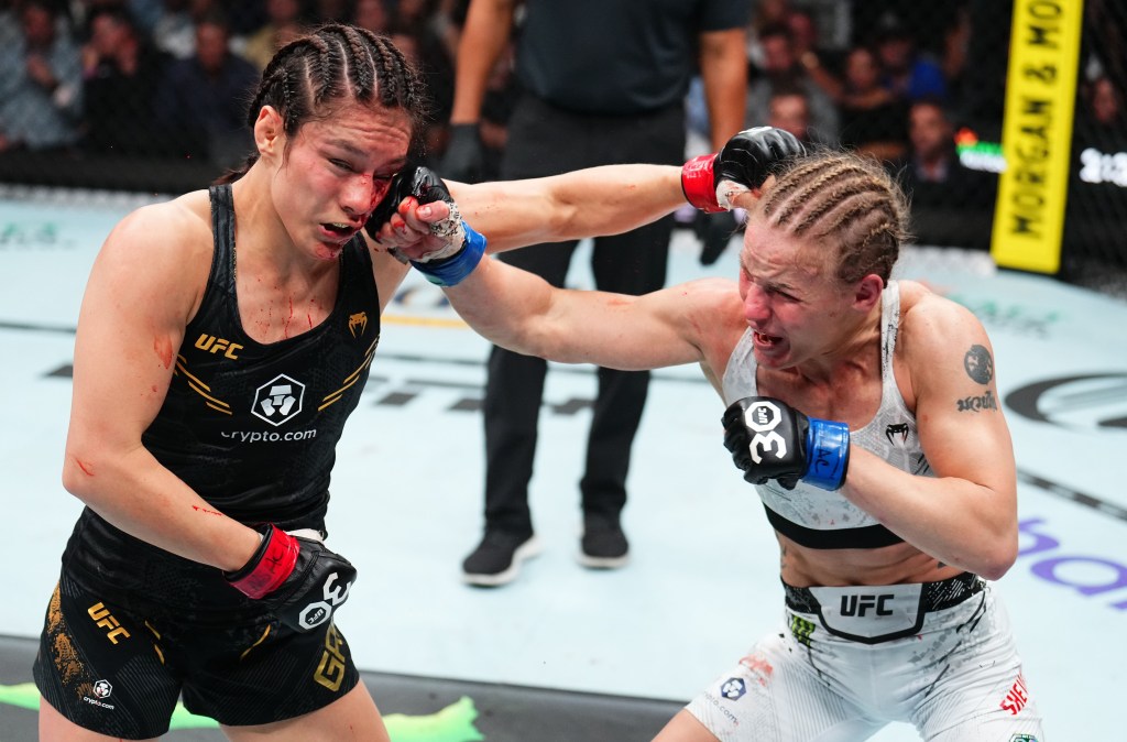 Alexa Grasso (left) and Valentina Shevchenko exchange punches during their split draw.