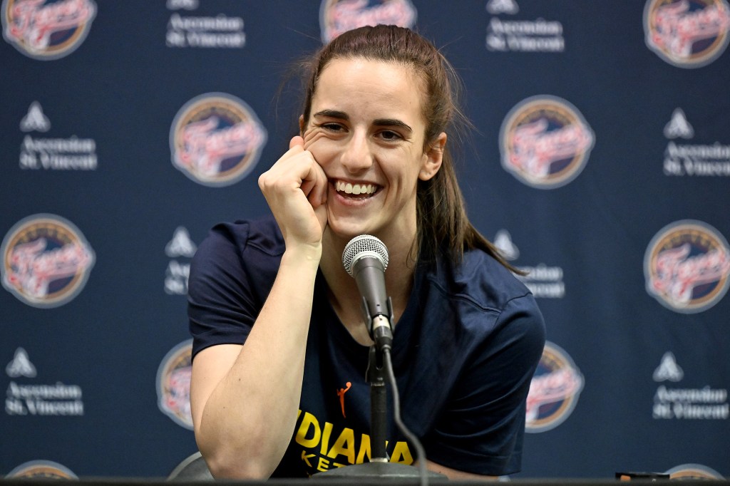 Caitlin Clark addresses reporters before the Fever's game against the Mystics.