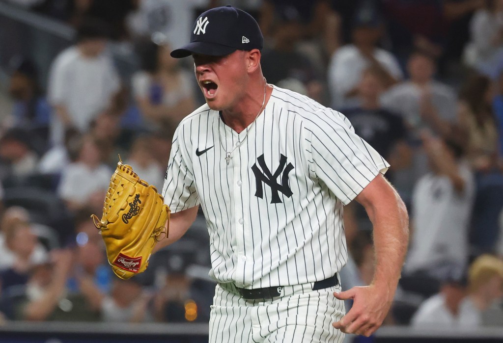 Caleb Ferguson celebrates after retiring the Dodgers' top hitters in order in the eighth inning during the Yankees' loss on Friday night.