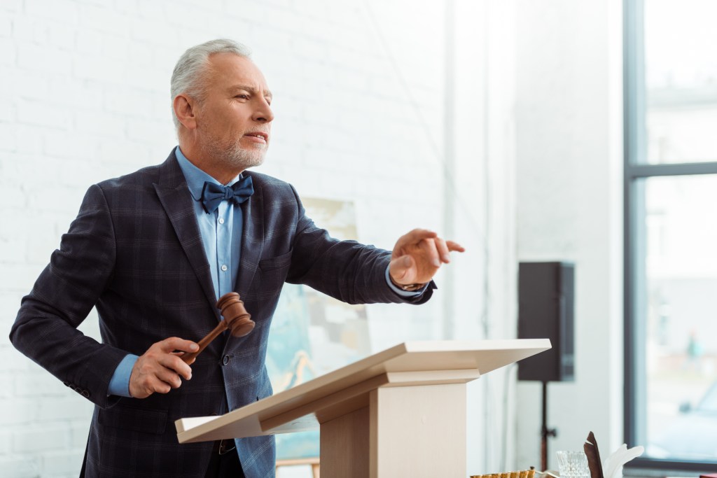 A stock image of an auctioneer.