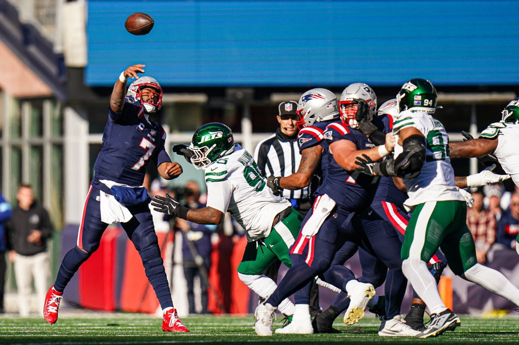 Jacoby Brissett throws a pass during the Patriots' win over the Jets on Oct. 27, 2024. 