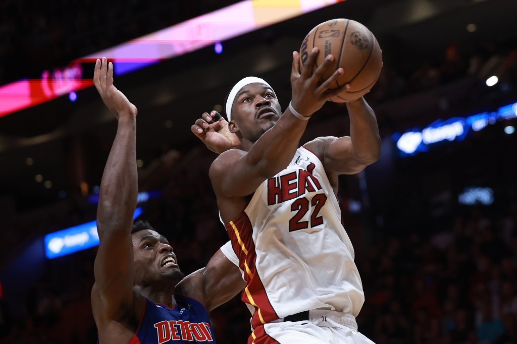 Jimmy Butler #22 of the Miami Heat drives to the net against the Detroit Pistons during the second half at Kaseya Center on October 28, 2024 in Miami, Florida.