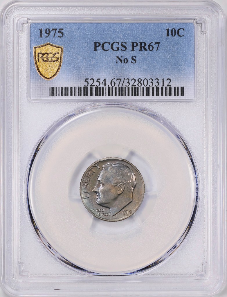 A 1975 proof set dime without the San Francisco Mint's letter S mintmark, displayed in a plastic container