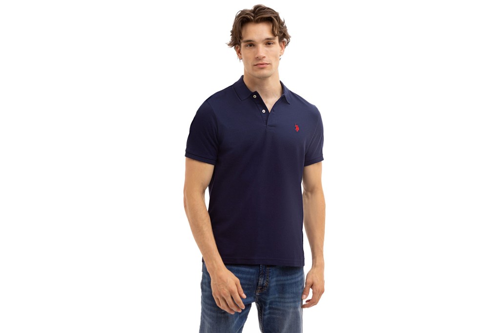 Man wearing navy polo shirt