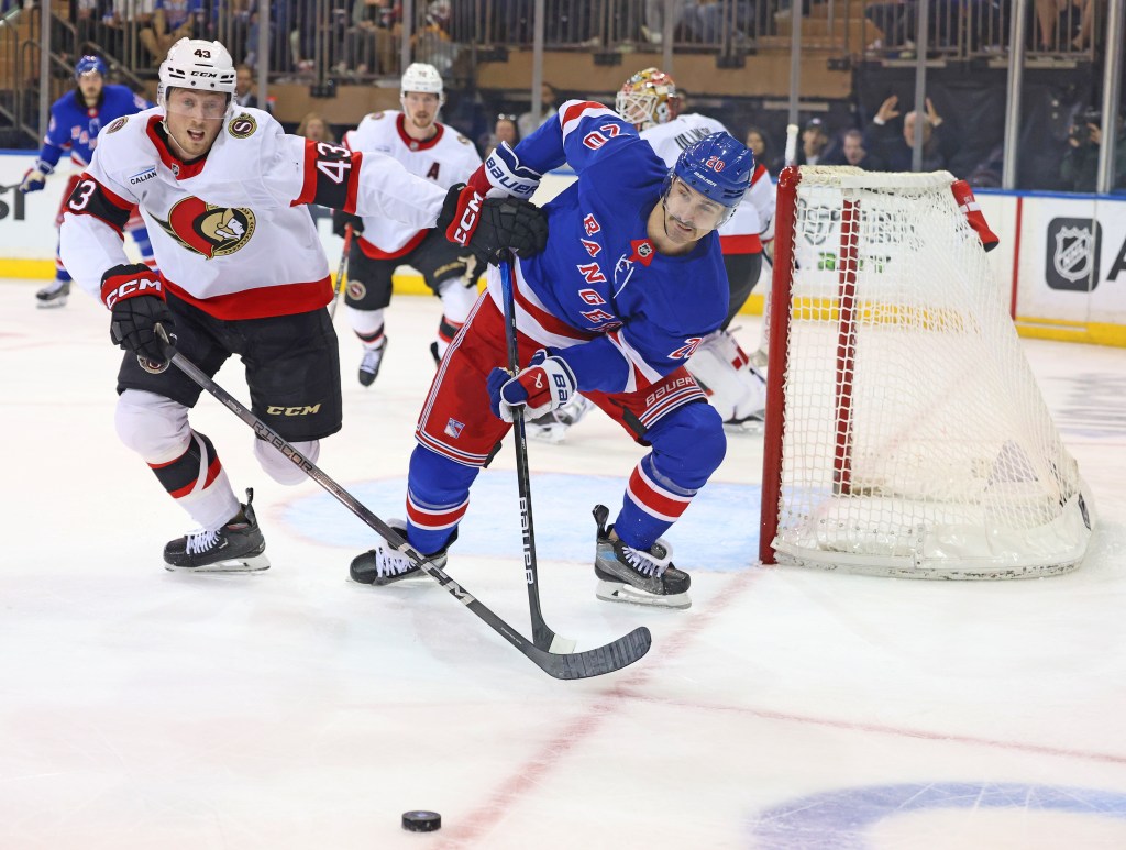 Chris Kreider, battling Tyler Klevin for the puck during the Rangers' win over the Senators, was dropped to a unit alongside Filip Chytil and Kaapo Kakko during Saturday's practice.