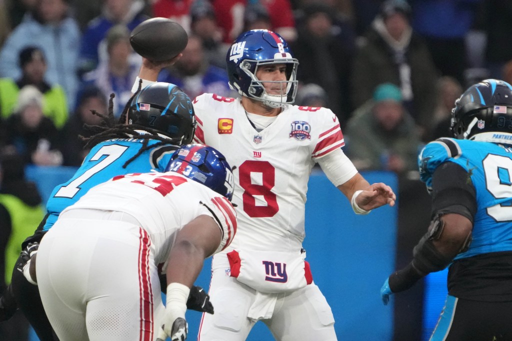 New York Giants quarterback Daniel Jones (8) throws the ball against the Carolina Panthers in the first half during the 2024 NFL Munich Game at Allianz Arena. 