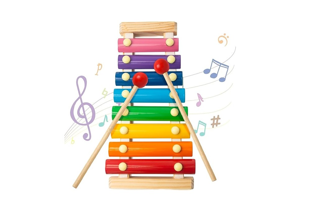 A toy xylophone with musical notes