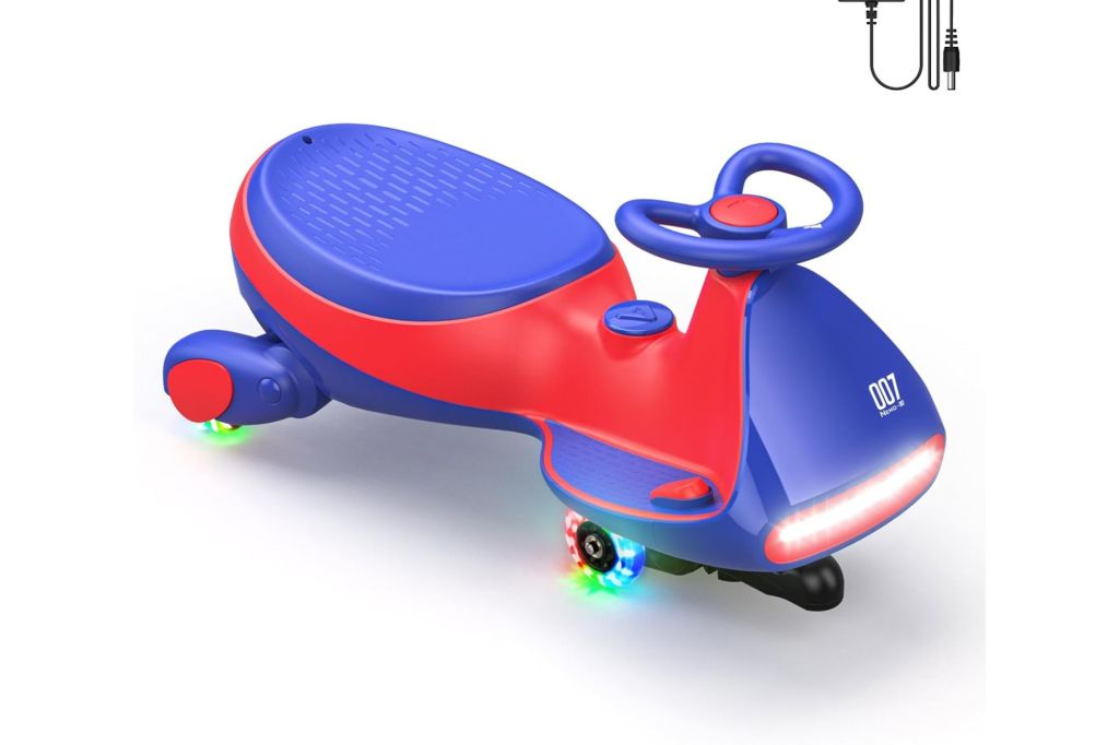 A small ridable car for kids with lit up wheels.