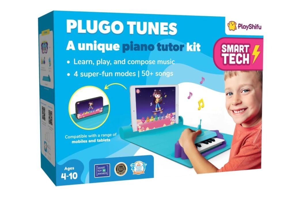 A blue box with an image of a a kid playing a mini piano in front of a tablet.