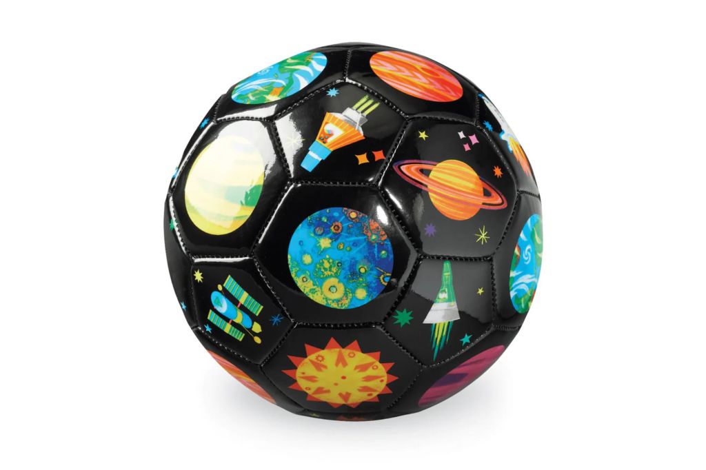 A black soccer ball with a galaxy print.