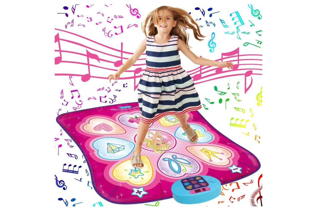 A dance pad for kids' with a girl dancing over it.