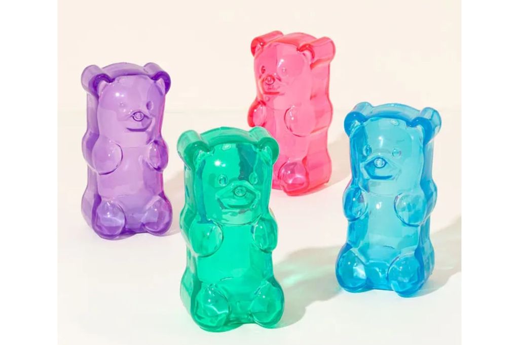 Four translucent gummy bear toys