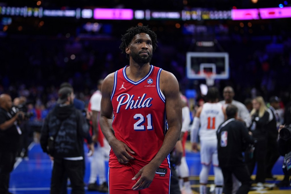 Philadelphia 76ers' Joel Embiid walks off the court after the 76ers lost an Emirates NBA Cup basketball game against the New York Knicks, Tuesday, Nov. 12, 2024, in Philadelphia.