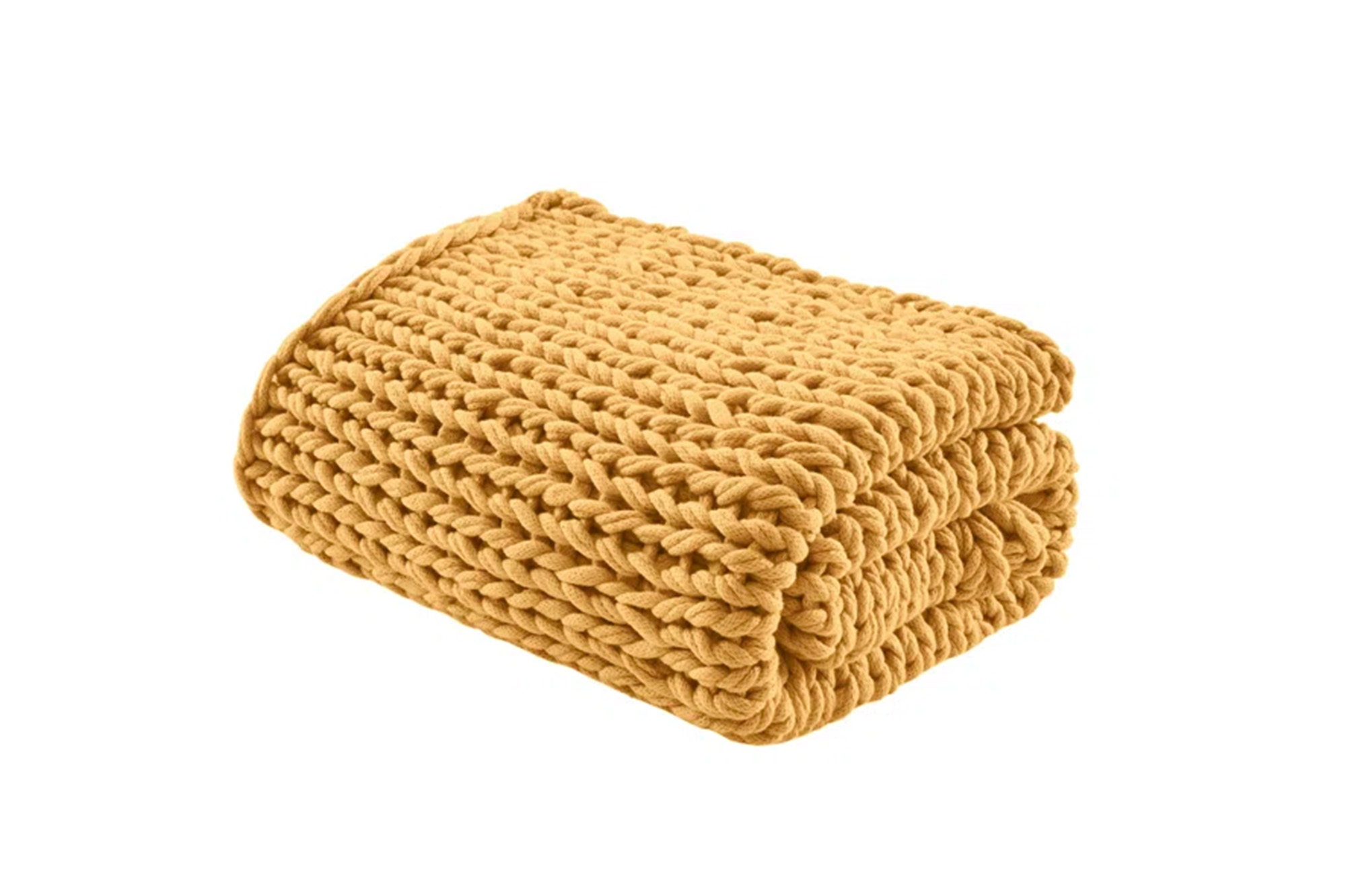 A gold chunky knit throw