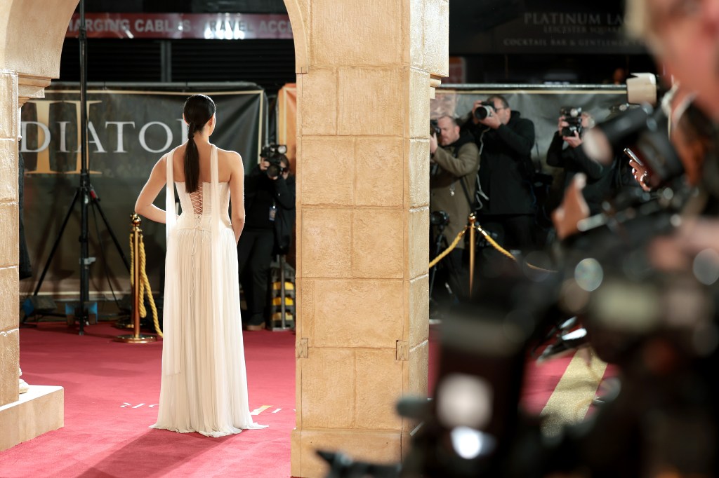 Yuval Gonen in a white dress at the Gladiator II Royal Film Performance and Global Premiere in London, England on November 13, 2024