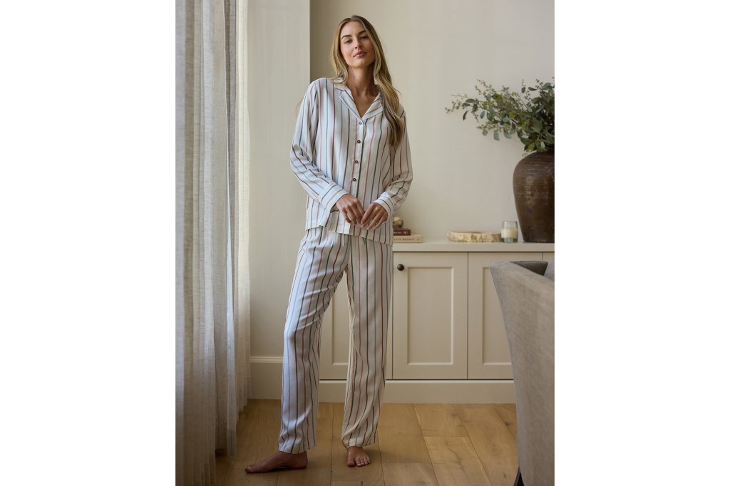 woman posing in striped pajamas