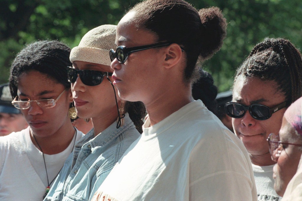 Malcolm X's daughters Malikah Shabazz, left, Attallah Shabazz, second from left, Malaak Shabazz, third from left, and Gamilah Shabazz, talk to the media outside the Jacobi Medical Center in the Bronx borough of New York, following the death of their mother, Betty Shabazz, June 23, 1997.